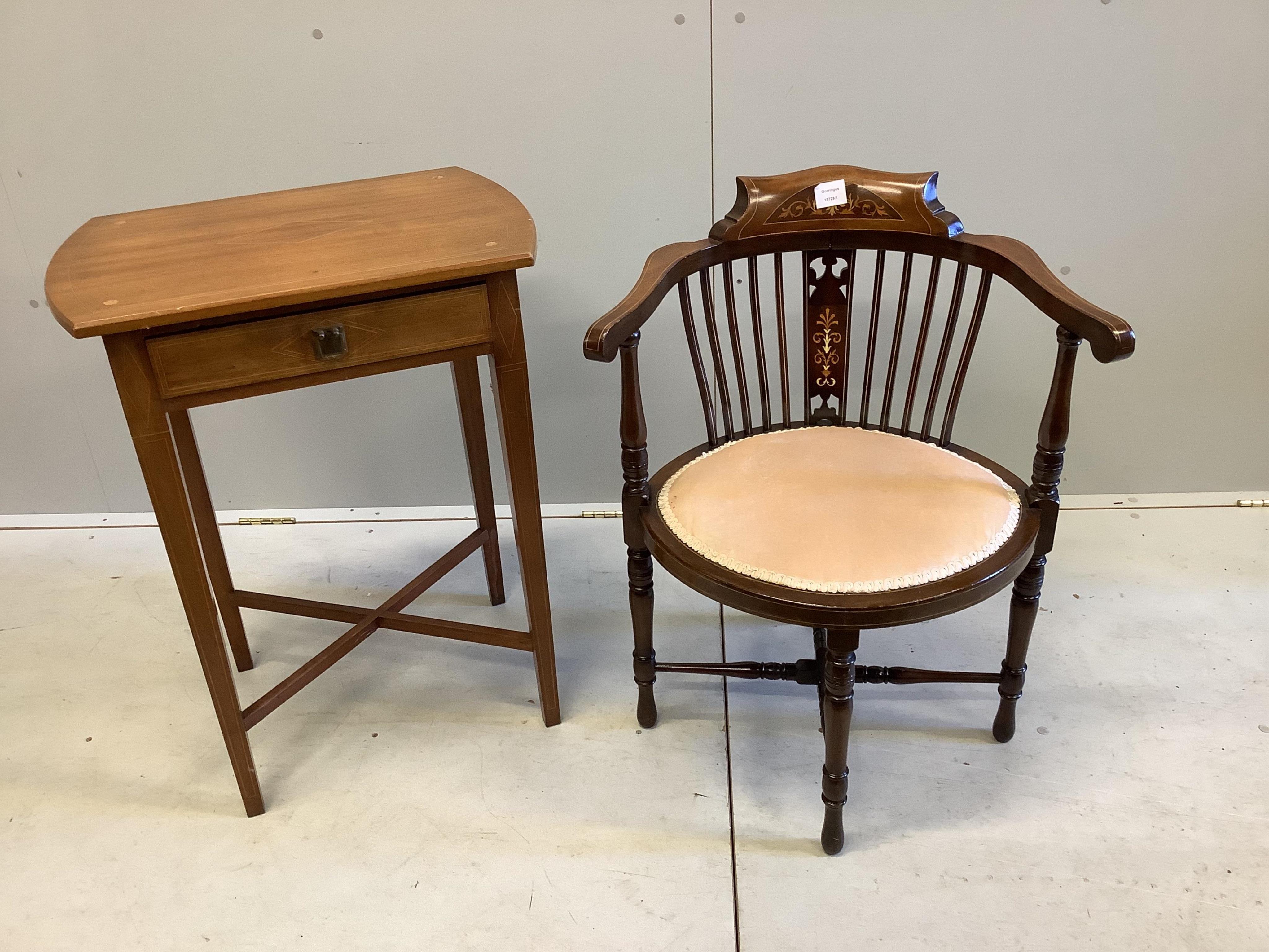 An Edwardian inlaid mahogany tub chair and a strung mahogany work table, width 58cm. Condition - fair